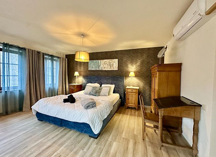 Relax in the recreation room of Leora Cosy, a vacation home in Membre, Ardennes, Belgium, with an inviting pool table.