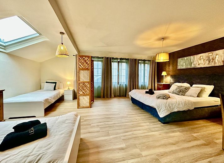 Relax in the recreation room of Leora Cosy, a vacation home in Membre, Ardennes, Belgium, with an inviting pool table.