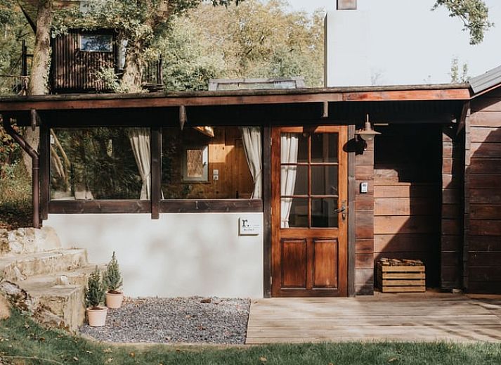 Cozy terrace of Cottage in Dion, cottage in the Ardennes, Belgium, ideal for outdoor dining in nature.