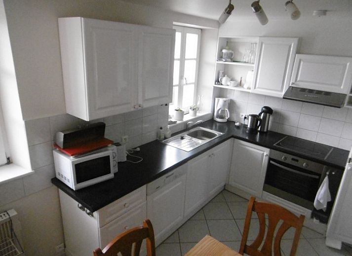 Gezellige woonkamer in TOPLOCATIE Gite Zwaluwnest vakantiehuis in Herresbach, Ardennen, Belgie.