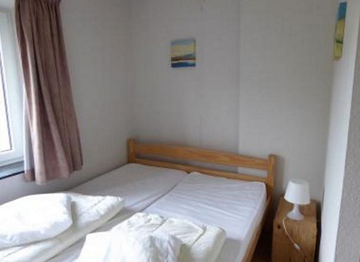 ARD103 vakantiehuis in Dochamps, Ardennen met ruime tuin en stenen gevel voor een ontspannen verblijf.