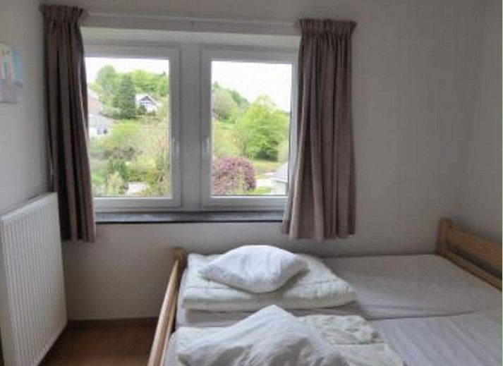 ARD103 vakantiehuis in Dochamps, Ardennen met ruime tuin en stenen gevel voor een ontspannen verblijf.