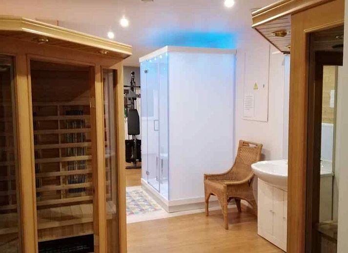 Prachtige natuurlijke omgeving van ARD103 in Dochamps, Ardennen, met weids uitzicht op groene heuvels.