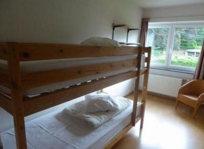 Prachtige natuurlijke omgeving van ARD103 in Dochamps, Ardennen, met weids uitzicht op groene heuvels.