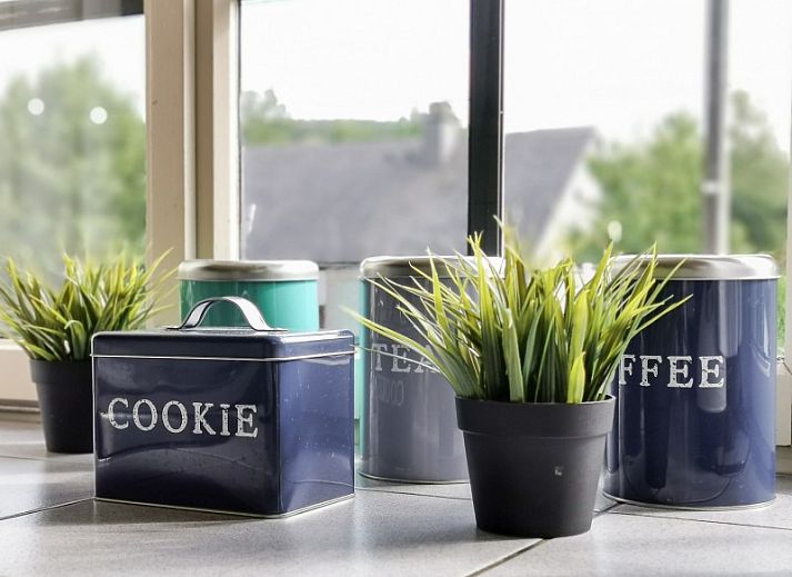 Gezellige woonkamer van La Villa in Dochamps, Ardennen, vakantiehuis met comfortabele banken in Luxemburg, Belgie.