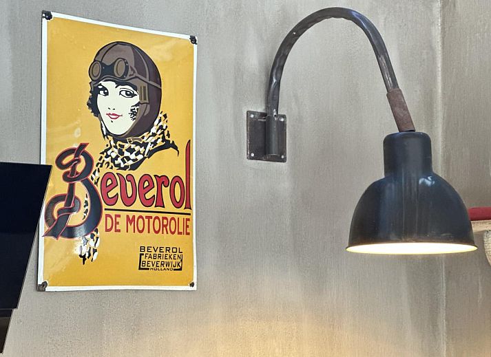 Stylish bedroom and luxury bath in Chez Brigitte, a vacation home in Durbuy, Ardennes, Belgium, with rustic charm and comfort.