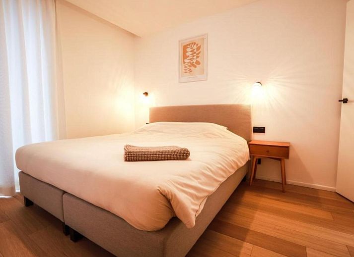 Stijlvolle binnenruimte van Be Durbuy vakantiehuis in de Ardennen, Belgie, met moderne inrichting en gezellige eethoek.