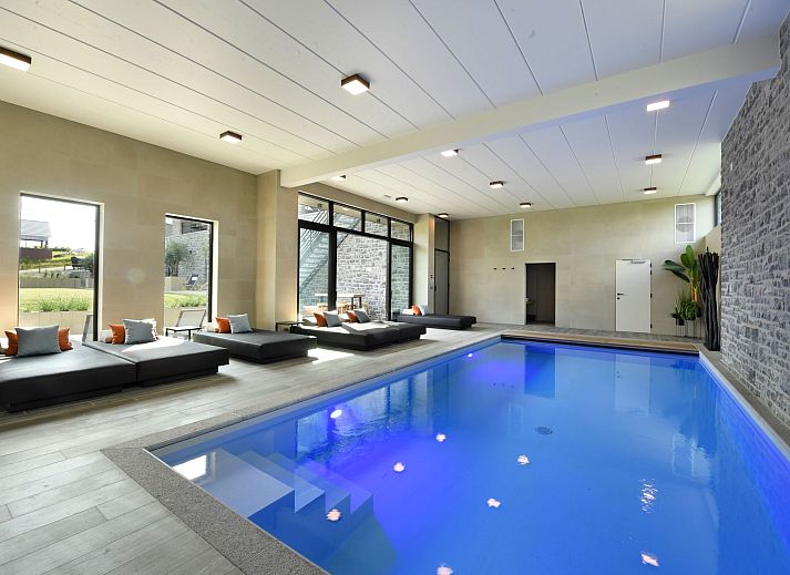 Luxurioeses Schlafzimmer im Ferienhaus Durbuy Suites, in den Ardennen, Belgien. Geniessen Sie Komfort und Stil in diesem eleganten Ferienhaus.