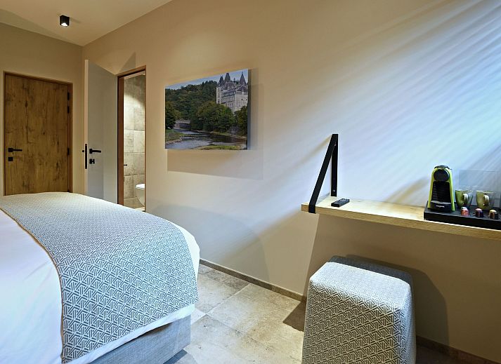 Entspannen Sie sich in der luxurioesen Sauna des Ferienhauses Durbuy Suites in den belgischen Ardennen und geniessen Sie ein Wellness-Erlebnis in ruhiger Umgebung.