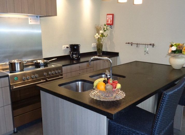 L'Oree de Bomal vakantiehuis in Durbuy, Ardennen, omgeven door groene natuur en charmante architectuur.