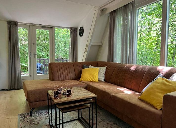 Chalet Du Bois IV in Durbuy, Ardennes, Belgium surrounded by green nature, perfect for a relaxing vacation rental experience.