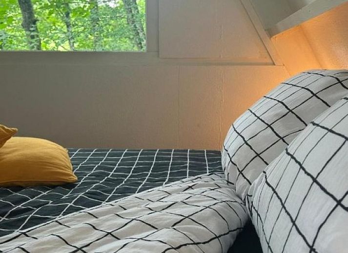 Chalet Du Bois IV in Durbuy, Ardennes, Belgium surrounded by green nature, perfect for a relaxing vacation rental experience.