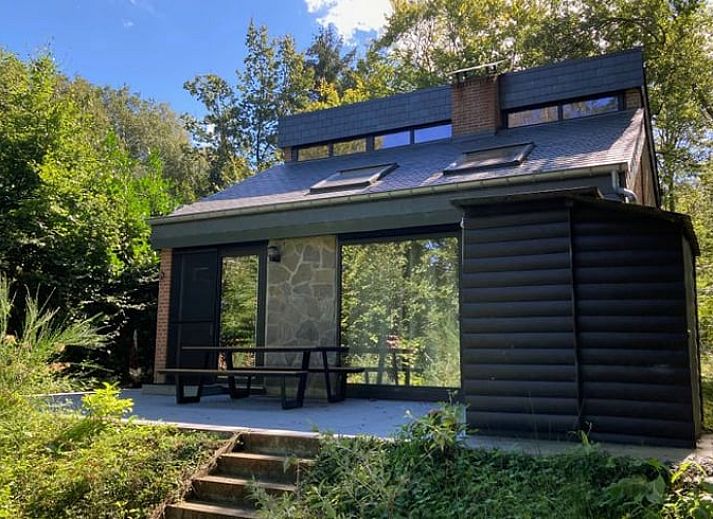 Cottage in Izier, a charming vacation home in the Ardennes, Luxembourg, Belgium, surrounded by green nature and peaceful surroundings.
