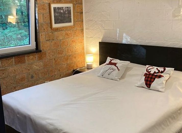 Cozy living room in Holiday home in Izier, Ardennes, Belgium with comfortable seating area and atmospheric lighting.