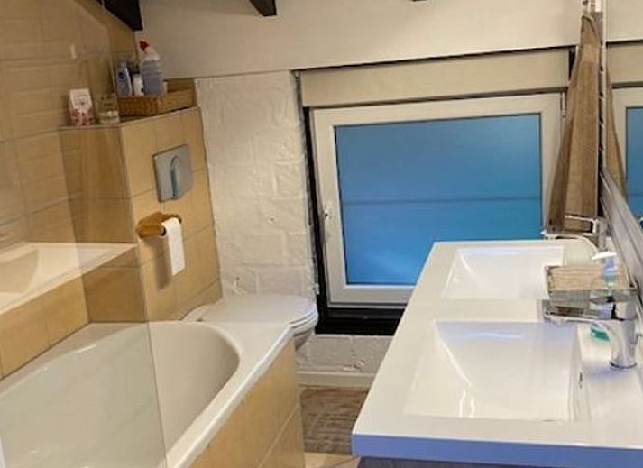 Cozy living room in Holiday home in Izier, Ardennes, Belgium with comfortable seating area and atmospheric lighting.
