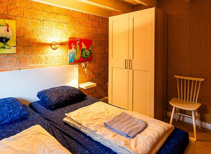 Geniet van de serene tuinomgeving bij Huisje in Izier, een vakantiehuis in de Ardennen, Luxemburg, Belgie.