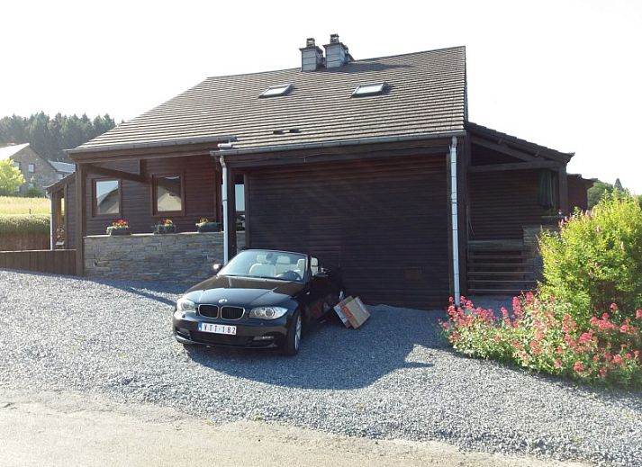 Cozy living room with fireplace in Au chalet de Corbion/ardenne, vacation home in Corbion, Ardennes, Belgium.