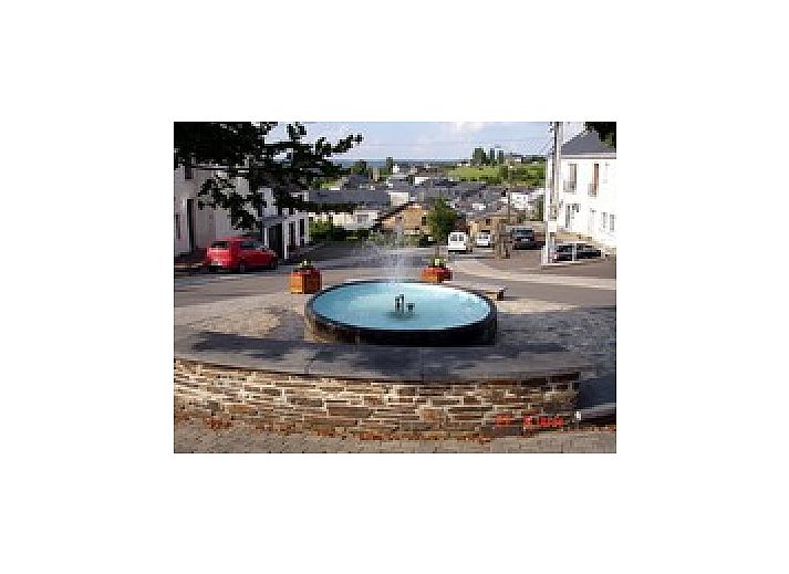 Cozy living room with fireplace in Au chalet de Corbion/ardenne, vacation home in Corbion, Ardennes, Belgium.
