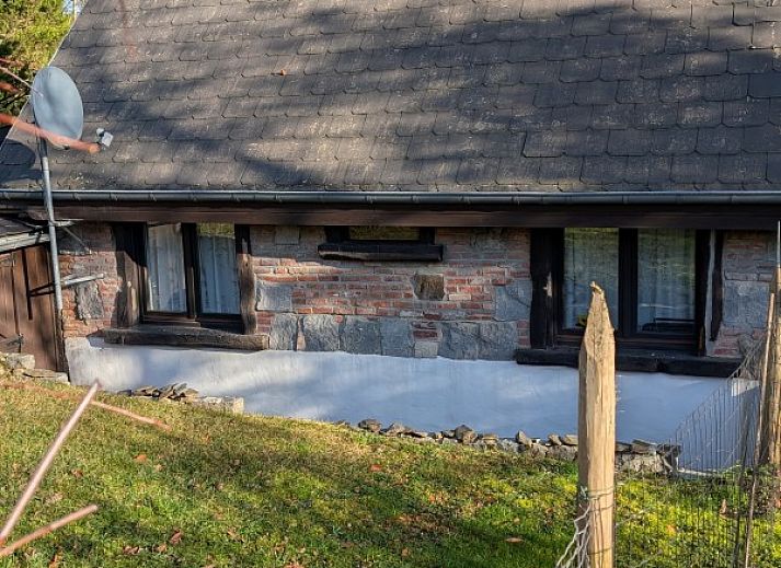 Knusse zithoek in Chouff vakantiehuis, Achouffe-Houffalize, met open haard in de Ardennen, Luxemburg, Belgie.