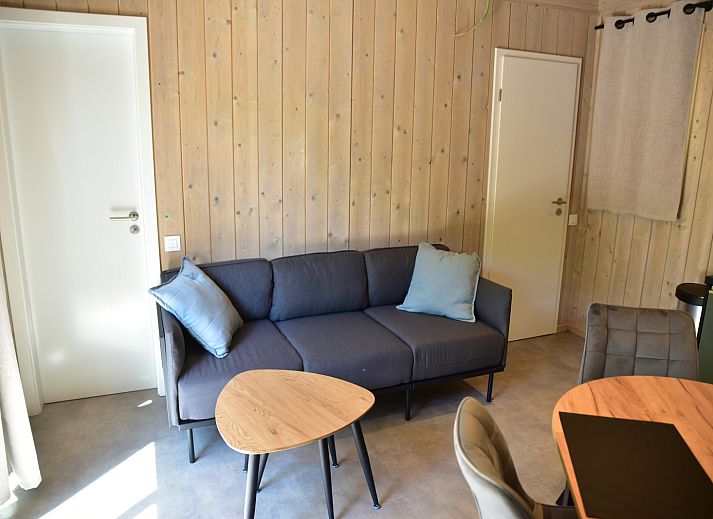 Ecolodge cottage with wooden terrace in the nature of Houffalize, Ardennes, Belgium.