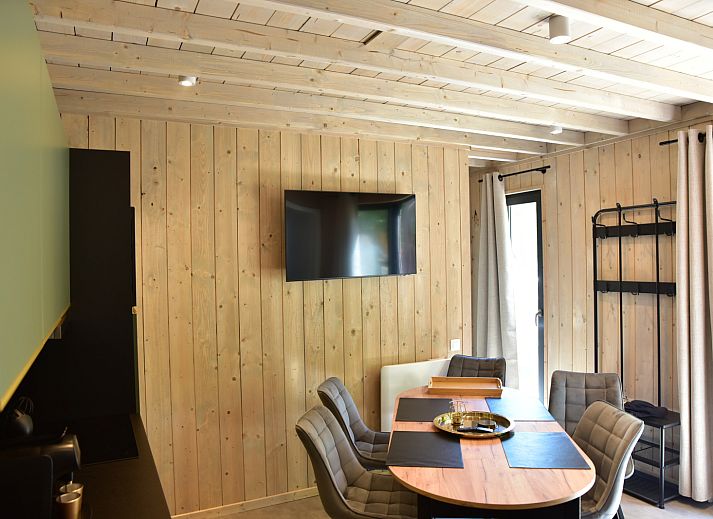 Ecolodge vacation home in Houffalize, Ardennes, Belgium with wooden terrace and surrounded by nature.