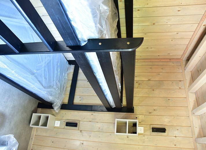 Ecolodge vacation home in Houffalize, Ardennes, Belgium with wooden terrace and surrounded by nature.