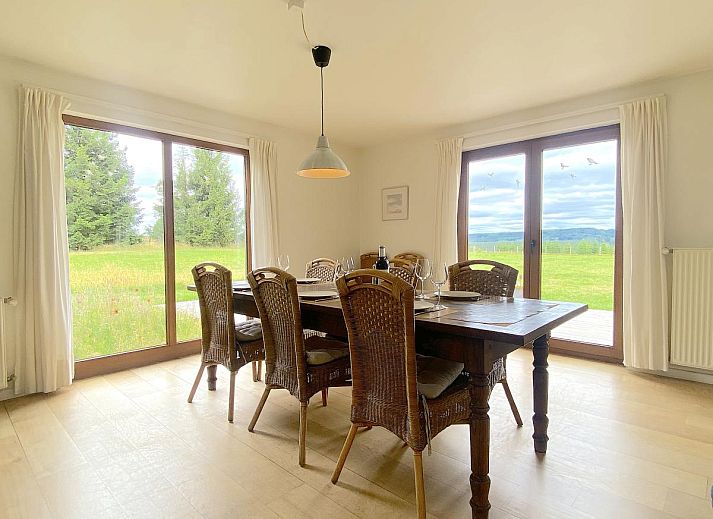 Cozy living room with comfortable seating area in Holiday Home Wilogne, perfect for family time.