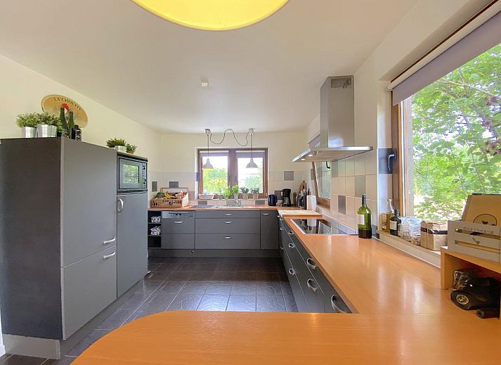 Playroom for children in Holiday Home Wilogne, Houffalize, with colorful interior and toys.