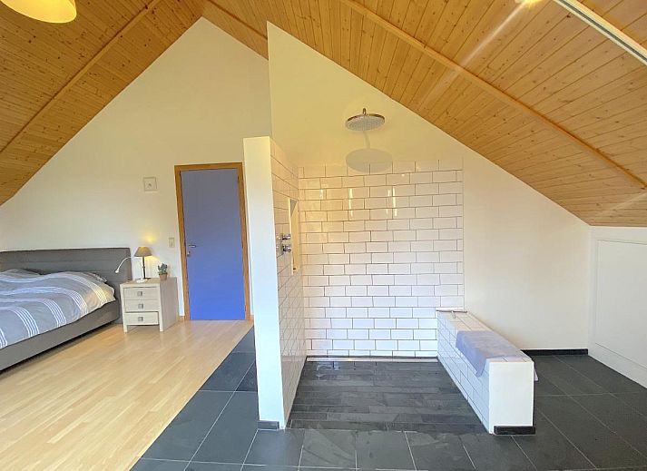 Playroom for children in Holiday Home Wilogne, Houffalize, with colorful interior and toys.