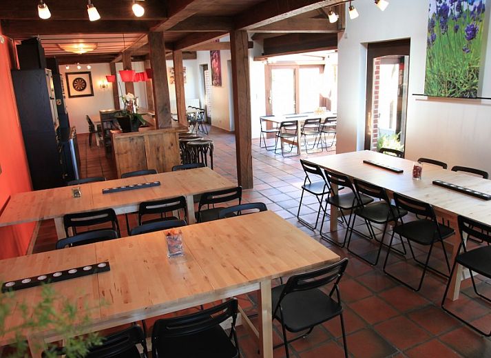 Uitzicht op de stenen gevel van L'Ambiance vakantiehuis in Bras-Haut, Luxemburg.