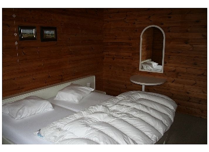 Huis Marcourt, vakantiehuis in de Ardennen, Belgi, met prachtig uitzicht op groene heuvels en bossen.