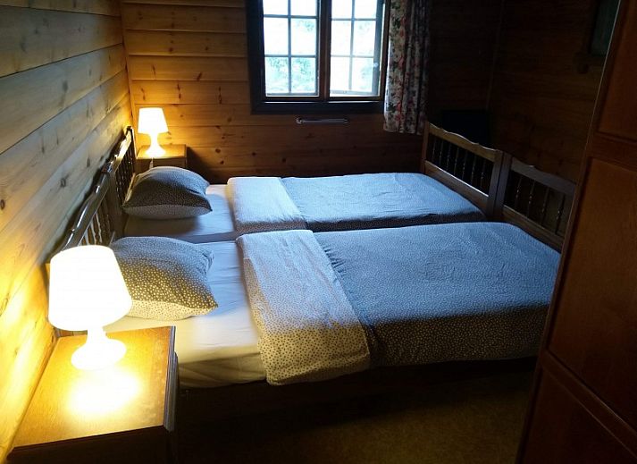 Rustieke charme van Chalet Ma Reine in Remouchamps, Ardennen, met uitzicht op bosrijk landschap.