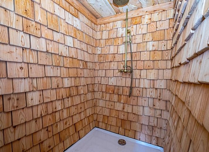 Cottage in Vesqueville, attractive wooden terrace on a stream in the Ardennes, Luxembourg, Belgium.