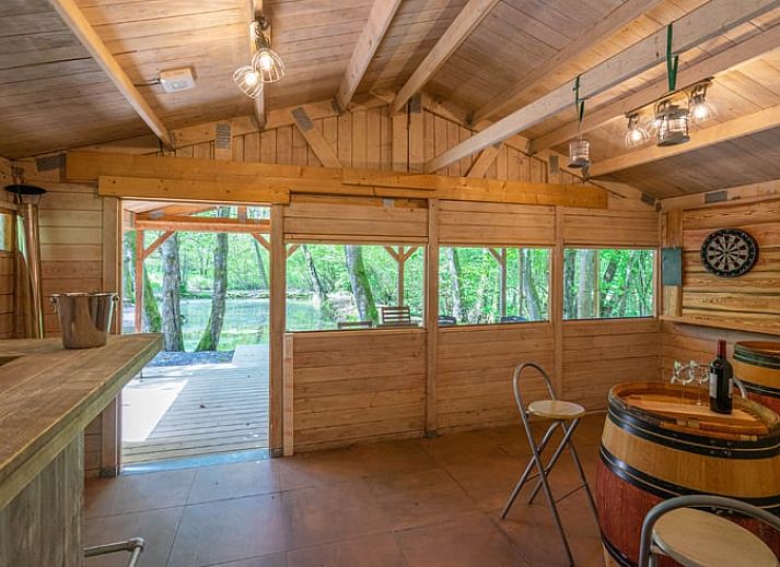 Vacation home in Vesqueville overlooking a pond, located in the quiet Ardennes, Luxembourg, Belgium.