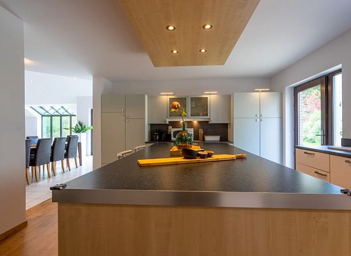 Vacation home in Vesqueville, natural setting with flowing stream in Ardennes, Luxembourg, Belgium.