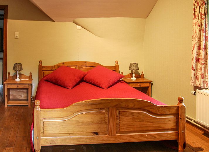 Gezellige woonkamer in Vakantiehuis La Rochette, Marche-en-Famenne, Ardennen, Belgie, met comfortabele zitruimte en warme inrichting.