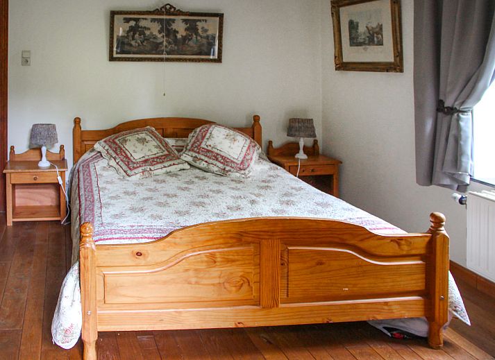 Gezellige woonkamer in Vakantiehuis La Rochette, Marche-en-Famenne, Ardennen, Belgie, met comfortabele zitruimte en warme inrichting.