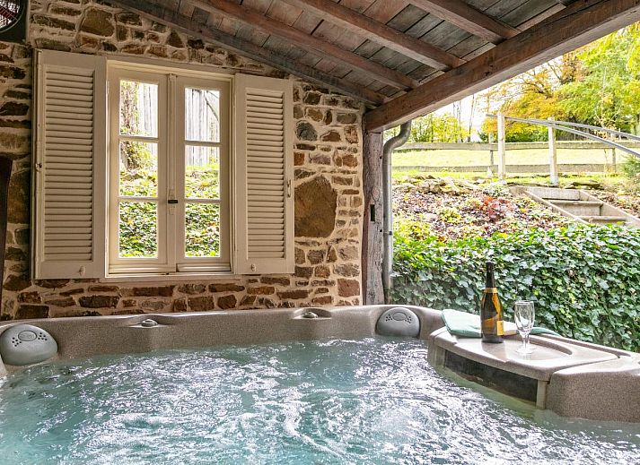Charming windows with flower boxes at vacation home Au Ballon in Manhay, Ardennes, Belgium.