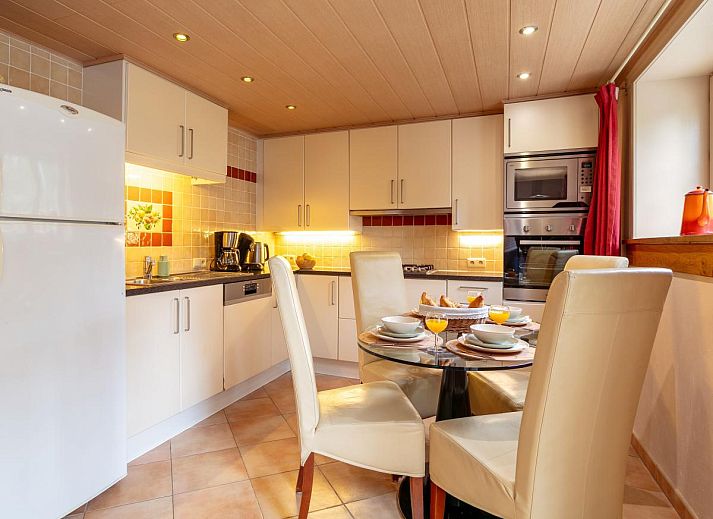 Charming windows with flower boxes at vacation home Au Ballon in Manhay, Ardennes, Belgium.