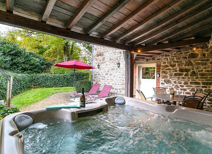 Cozy living room with wood stove in Au Ballon, vacation home in Manhay, Ardennes, Belgium.