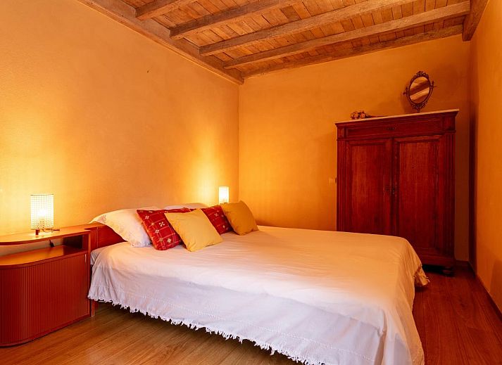 Cozy living room with wood stove in Au Ballon, vacation home in Manhay, Ardennes, Belgium.
