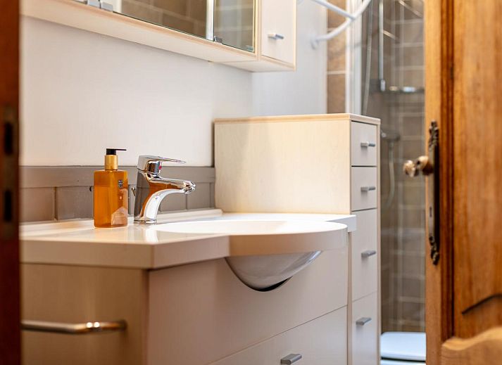 Dining area with view in vacation home Au Ballon, located in Manhay, Ardennes, Belgium.