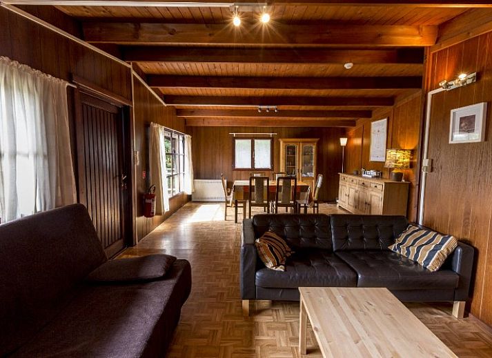 Spacious terrace at chalet Da Vinci in La Roche-en-Ardenne overlooking the forests of the Ardennes, Belgium.