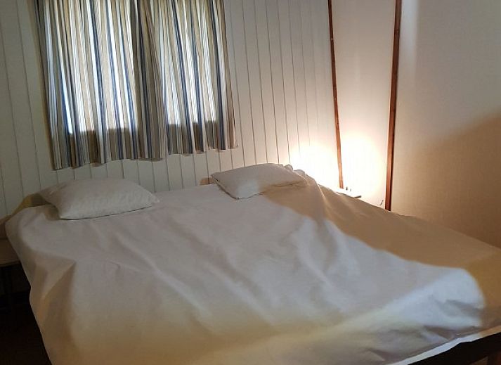 Spacious terrace at chalet Da Vinci in La Roche-en-Ardenne overlooking the forests of the Ardennes, Belgium.