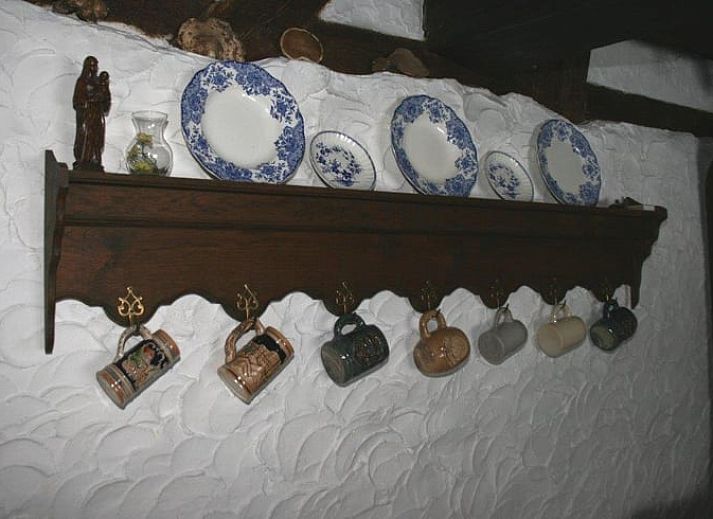 Charming Cottage in Buisson, vacation home in Ardennes, Luxembourg, Belgium with rustic stone facade and colorful flowers.