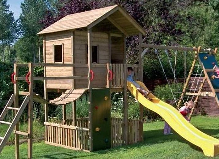 Cozy interior of Cottage in Buisson, vacation home in the Ardennes, Belgium, with rustic wooden details and rural charm.