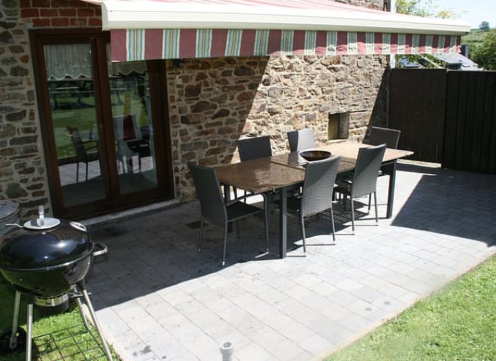 Cozy interior of Cottage in Buisson, vacation home in the Ardennes, Belgium, with rustic wooden details and rural charm.