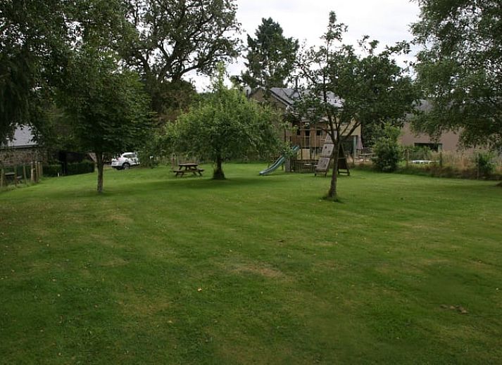 Attractive bedroom in Cottage in Buisson, cottage in the Ardennes, Belgium, with comfortable single beds and wooden interior.