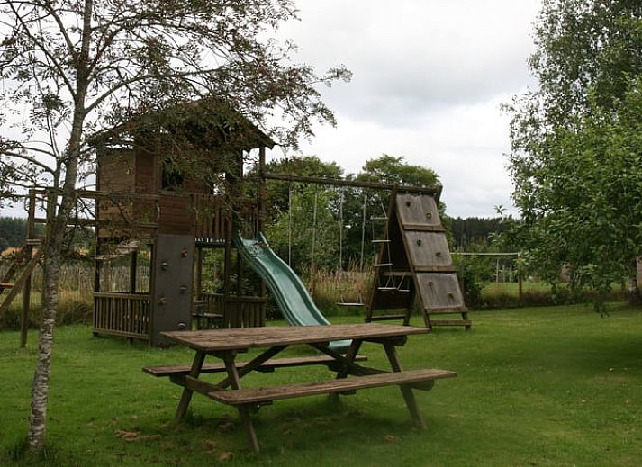 Attractive bedroom in Cottage in Buisson, cottage in the Ardennes, Belgium, with comfortable single beds and wooden interior.