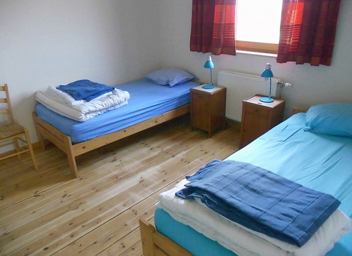 Gezellige woonkamer in La Terra vakantiehuis, Durbuy, met comfortabele banken.